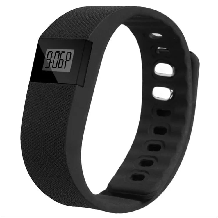 Ordinary bracelet pedometer in black, blue, green, orange, or yellow, showing display on 20mm wide wristband.