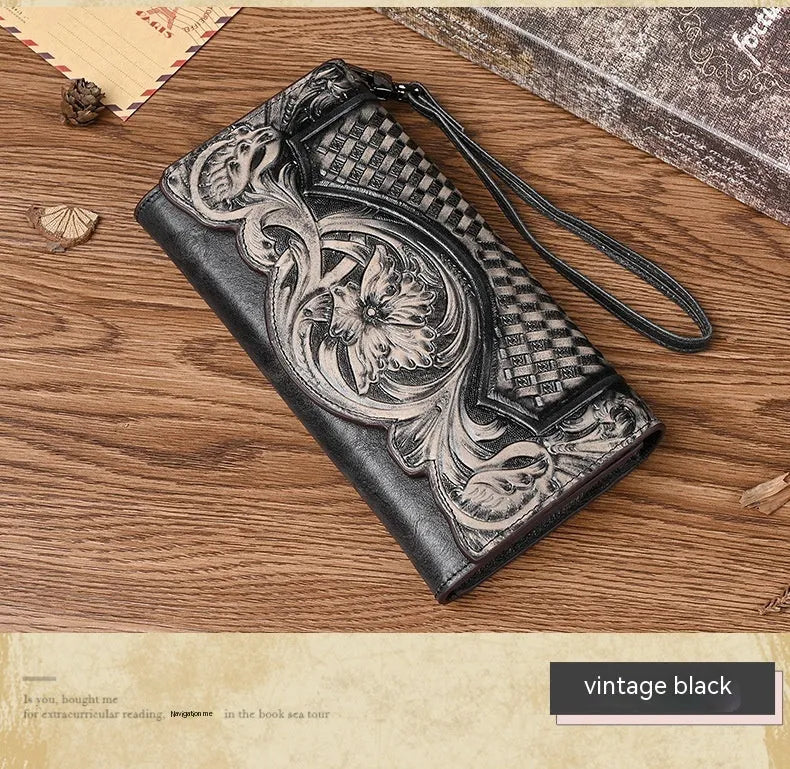 Women's retro brown tri-fold leather wallet with an embossed Chinese floral pattern, shown open.