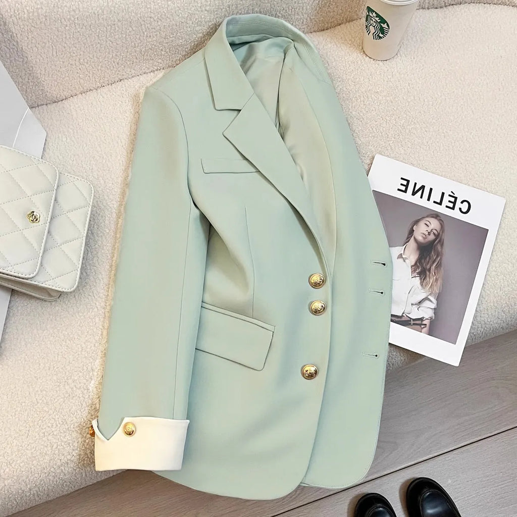 Women's Korean style loose fit coat in milky white with pockets and mid-length cut