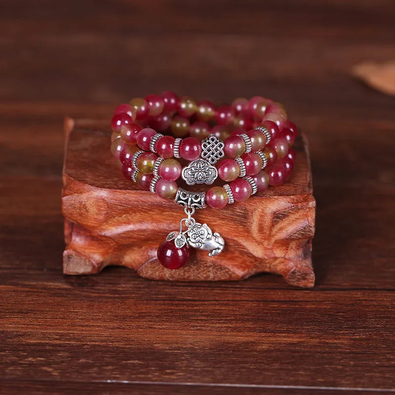 Watermelon crystal bracelet with Chinese knot design in 6mm or 8mm elephant style beads