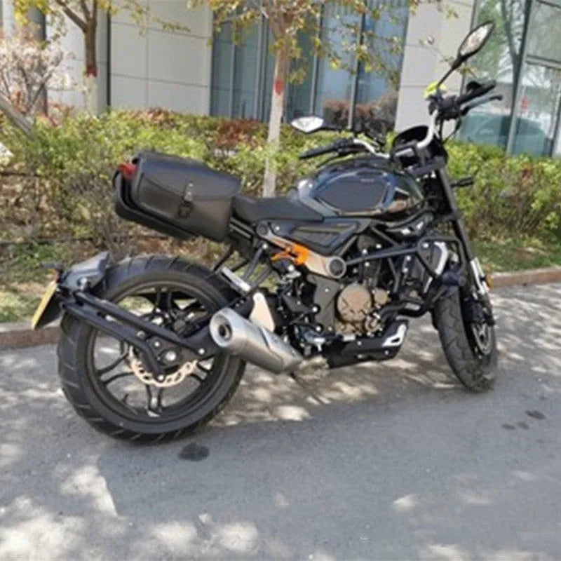 Black PU leather swingarm saddlebag mounted on a Harley Davidson Sportster motorcycle.