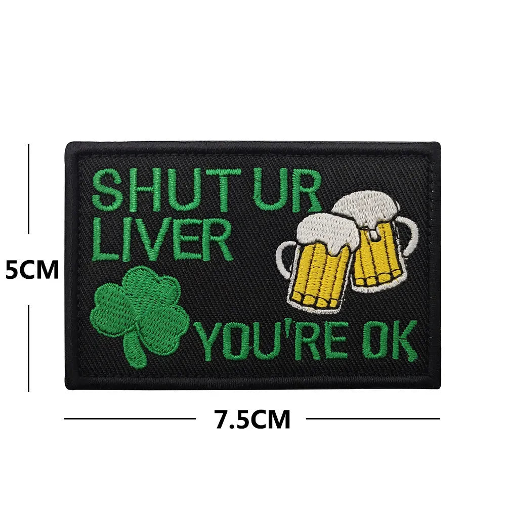 Embroidered fabric badge with hook and loop backing in various colour designs for industrial textile use
