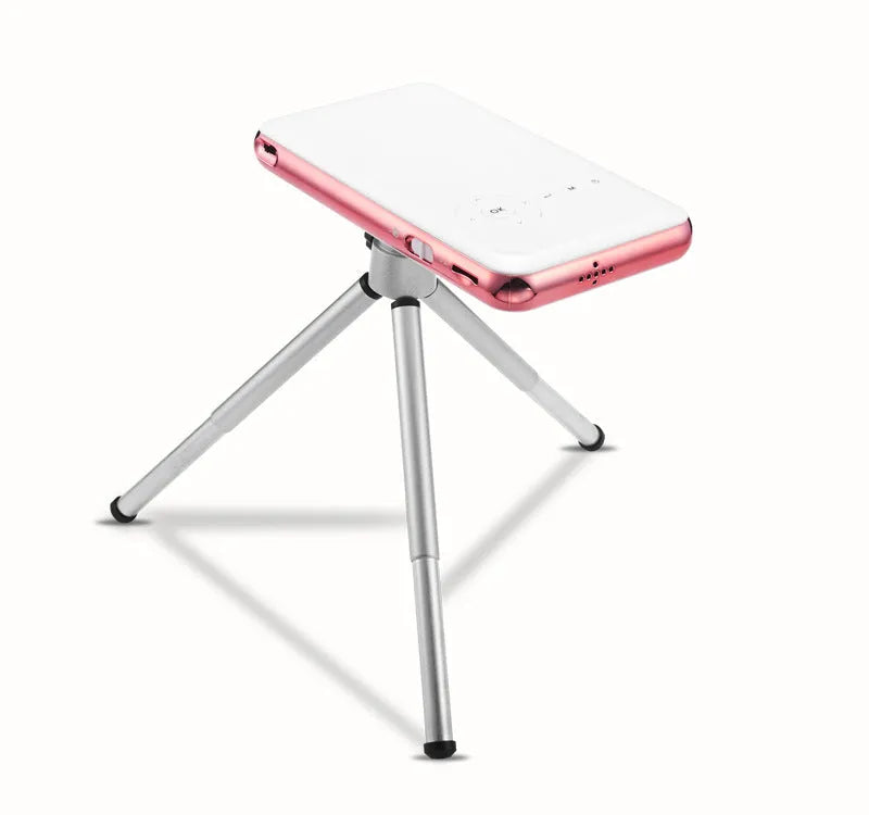 M6S miniature white and rose gold Android projector showing compact 145mm size with smartphone connectivity