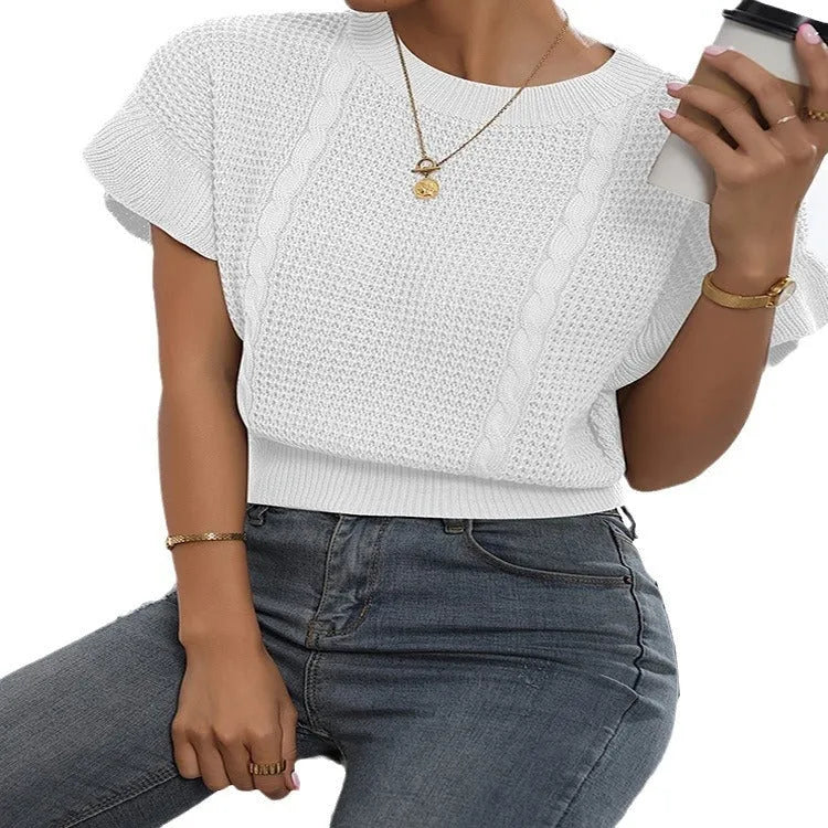 White knitted pullover sweater with ruffled short sleeves created from twisted string, shown in a loose fit.