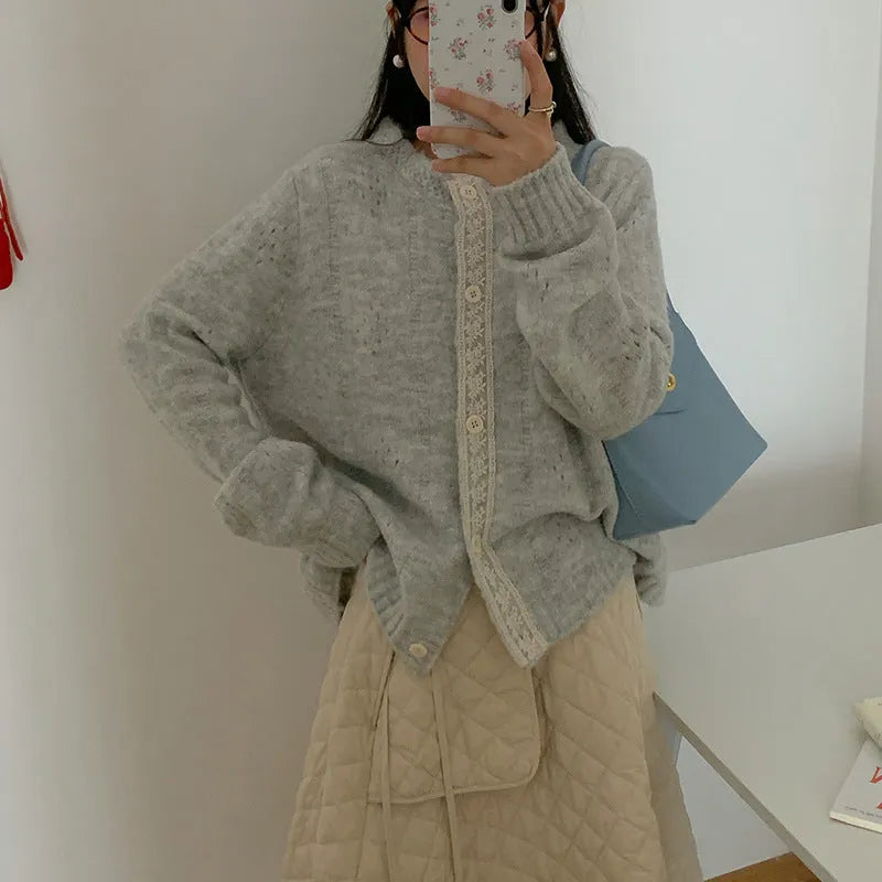 Artistic retro style loose fit viscose cardigan coat in apricot colour, shown open front.
