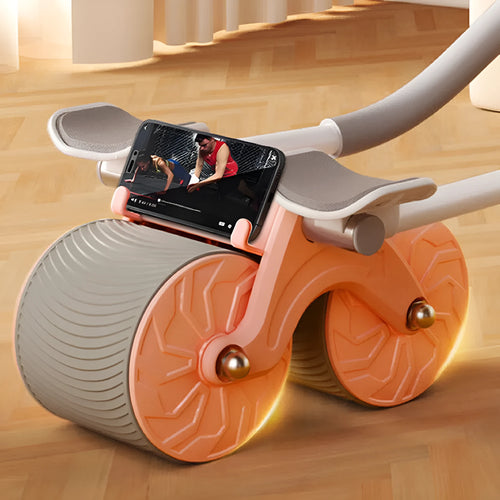 Black abdominal exercise wheel with automatic rebound mechanism beside red and black NBR yoga mat