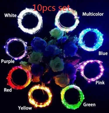 Wine bottle LED string lights with copper wire and bottle stopper for decorative illumination