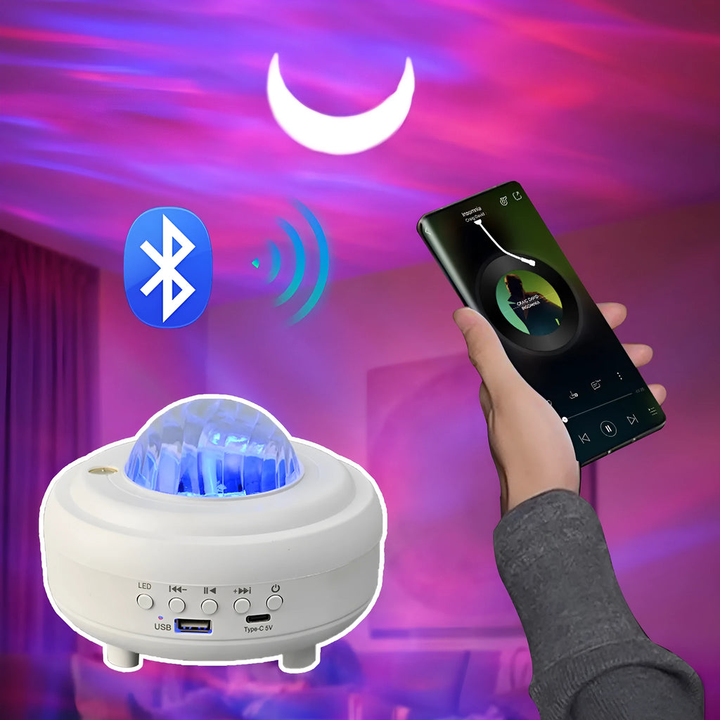 White Bluetooth galaxy star projector night lamp showing starry sky projection on a wall.