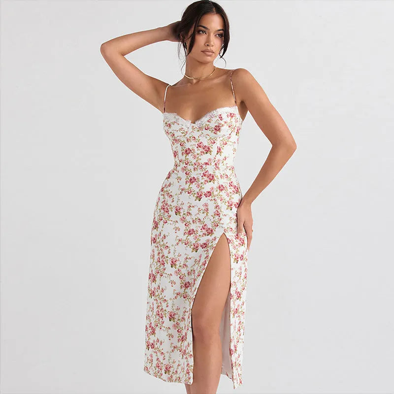 Women's blue lace flower print long dress with black suspender straps and a thigh-high side slit.