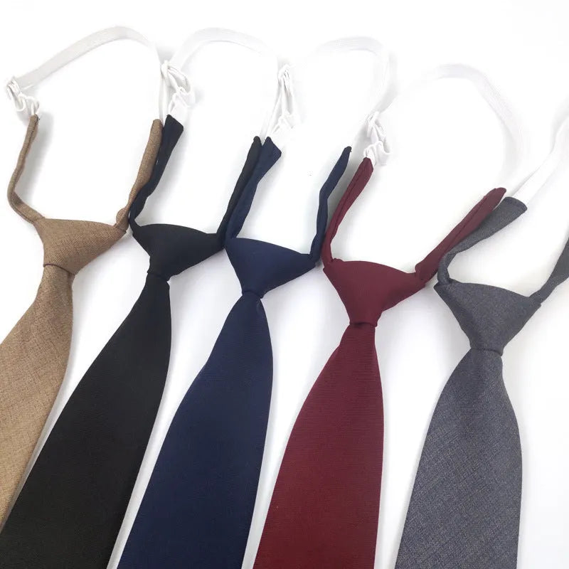 Men's navy blue cotton bow tie with arrow-type styling showing traditional bow tie shape and dimensions