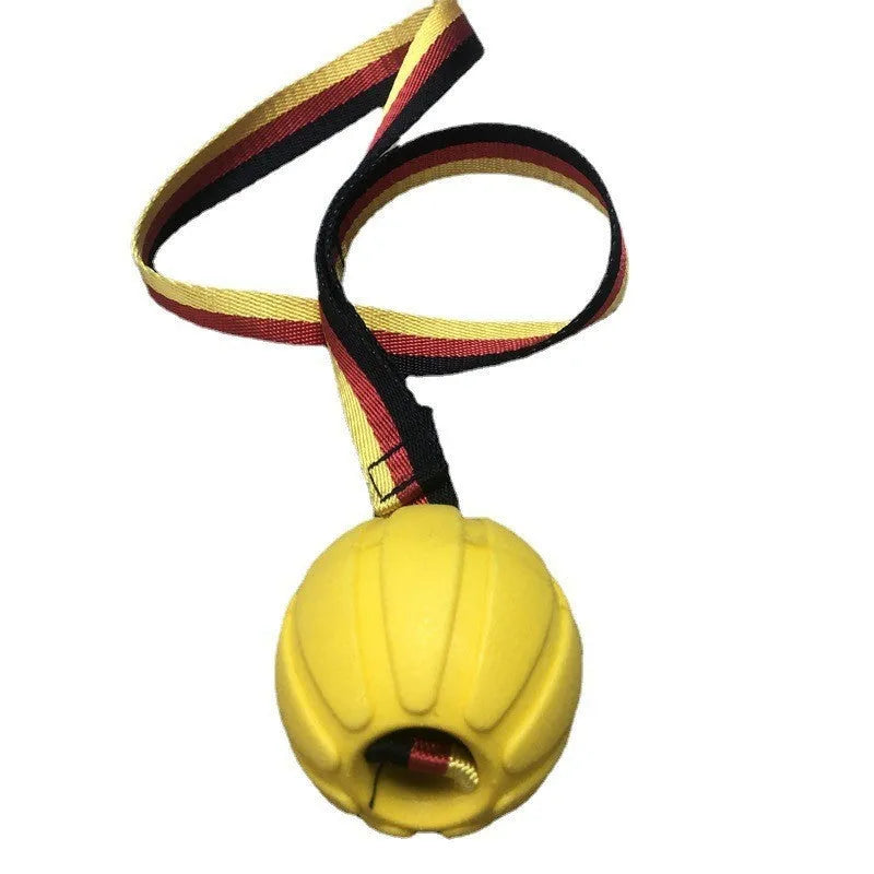 Camouflage and yellow EVA foam floating dog training balls in three different sizes on a blue background.