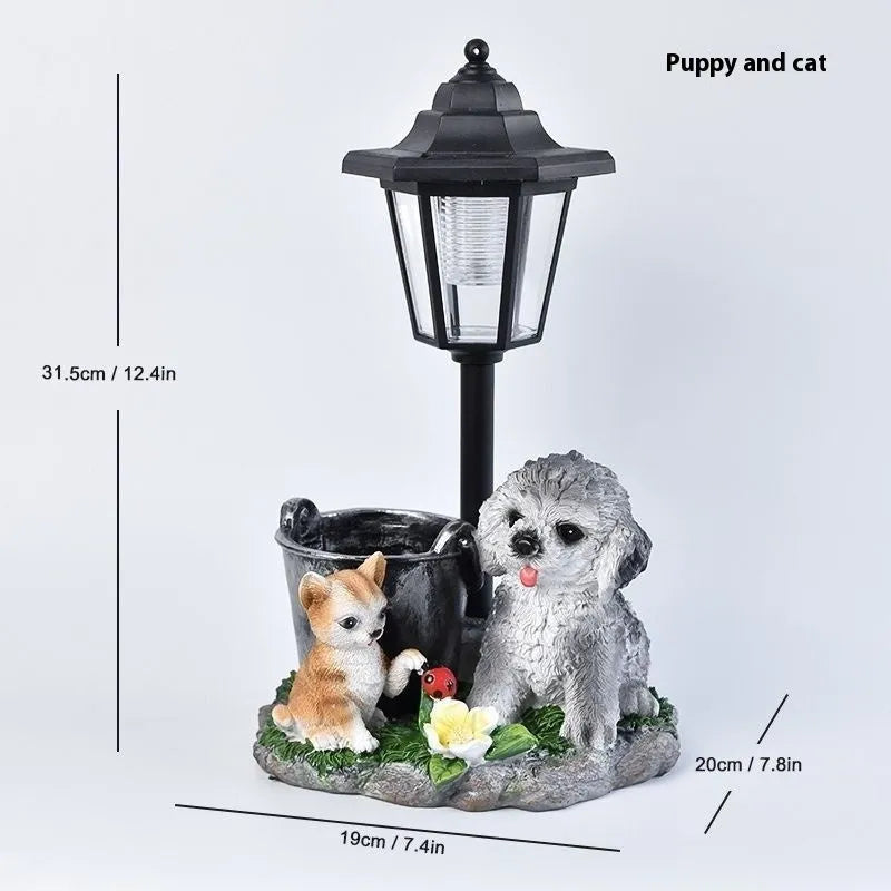 Solar hexagonal garden lamp with decorative resin figurine on plastic base for outdoor pathway lighting