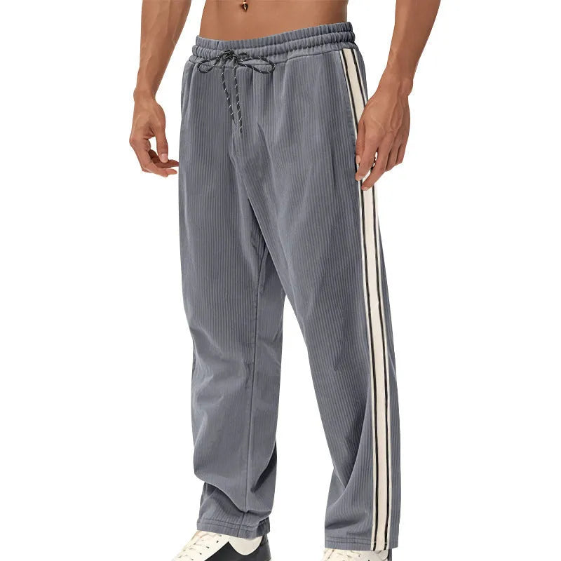 Men's corduroy track pants in dark blue side stripe loose fit