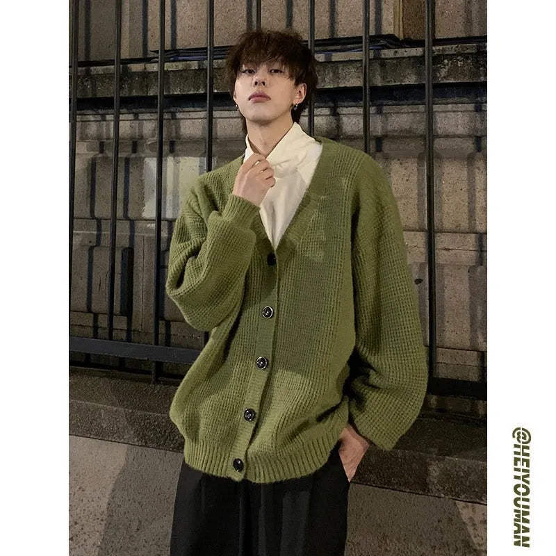 Men's solid colour V-neck knit cardigan in a loose fit, shown in army green.