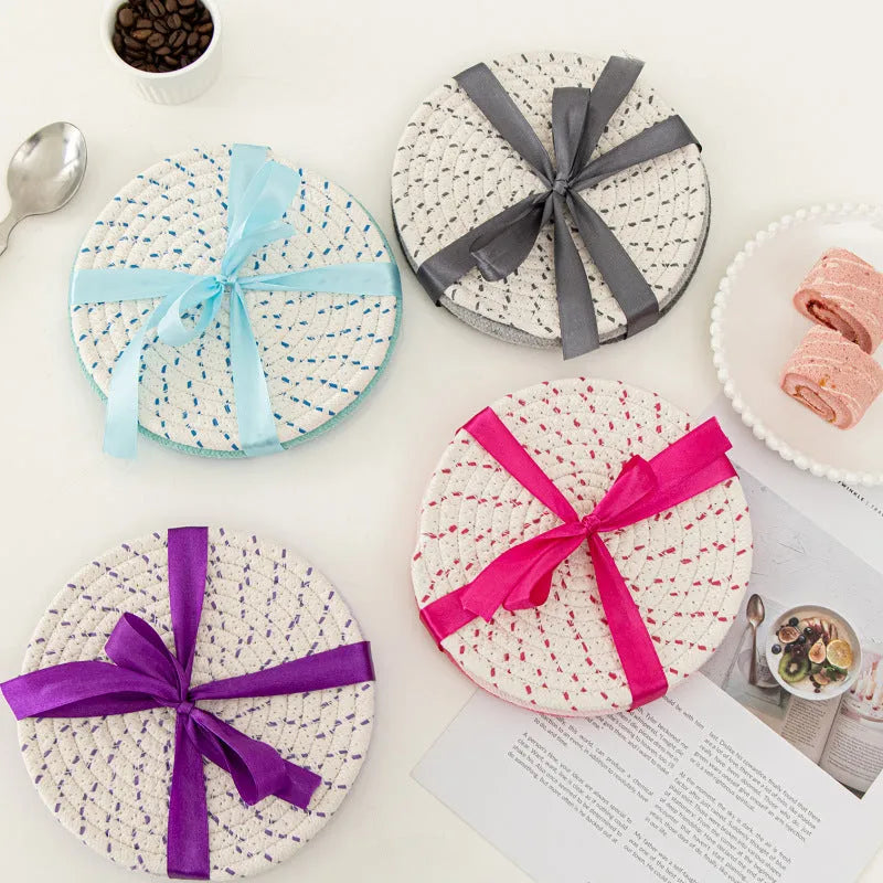 Set of three round cotton cord coasters in blue colour, each measuring 18cm diameter
