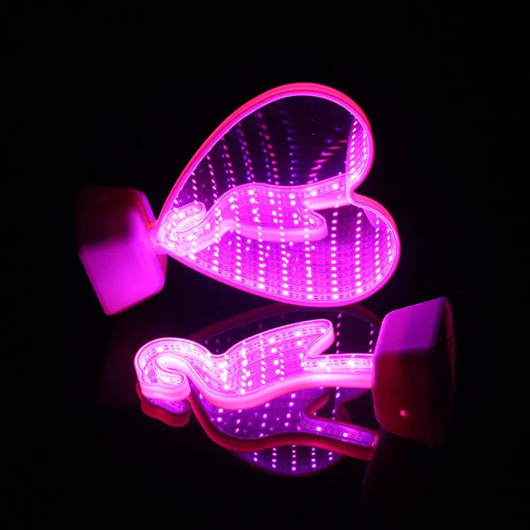 Plastic double-sided LED love tunnel light in rose red or dolphin colour, measuring 16cm long.