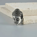 Stainless steel hollow skull Buddha earrings showing geometry shape and electroplated colour options