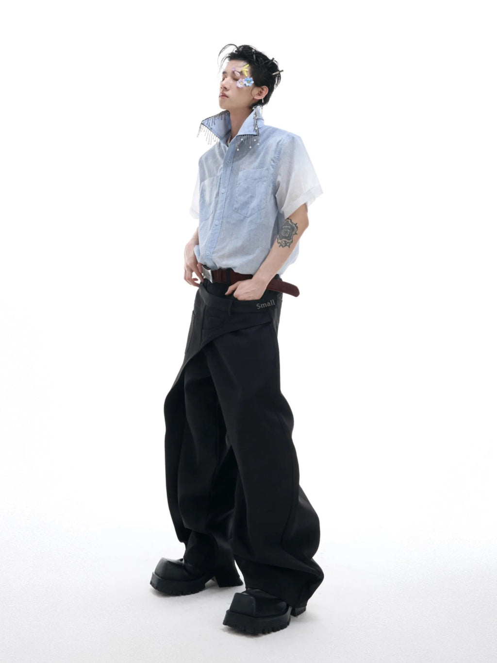 Man wearing a blue and white gradient loose fit short sleeve polyester summer shirt