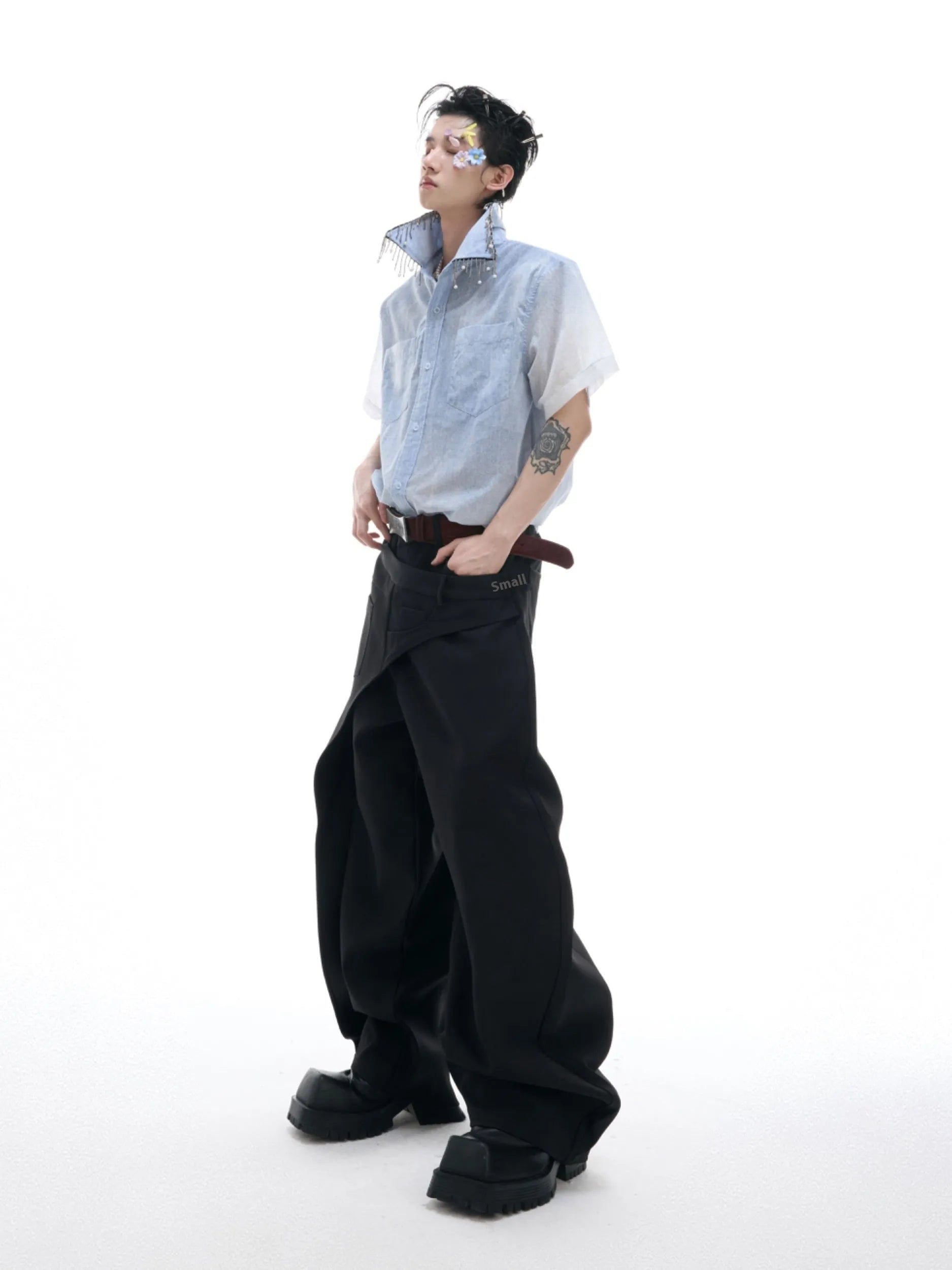 Man wearing a blue and white gradient loose fit short sleeve polyester summer shirt