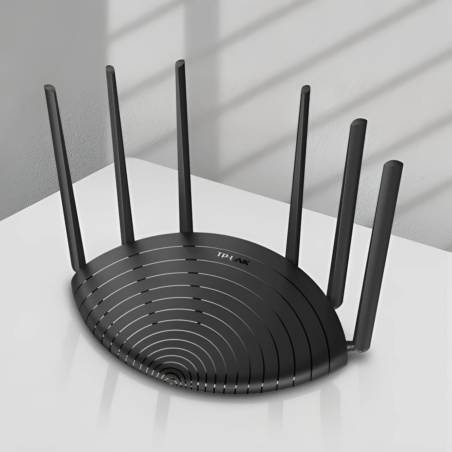 AC1900 wireless gigabit router with status display showing 254mm length on desk
