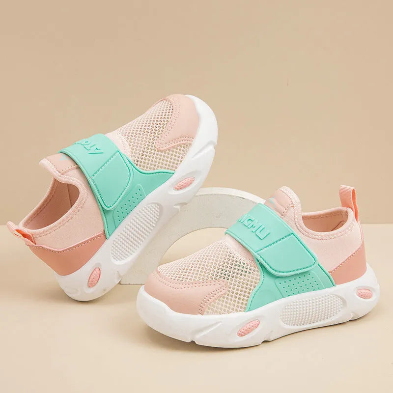 Children's slip-on shoes with soft rubber sole and PU upper in blue green colour on white background