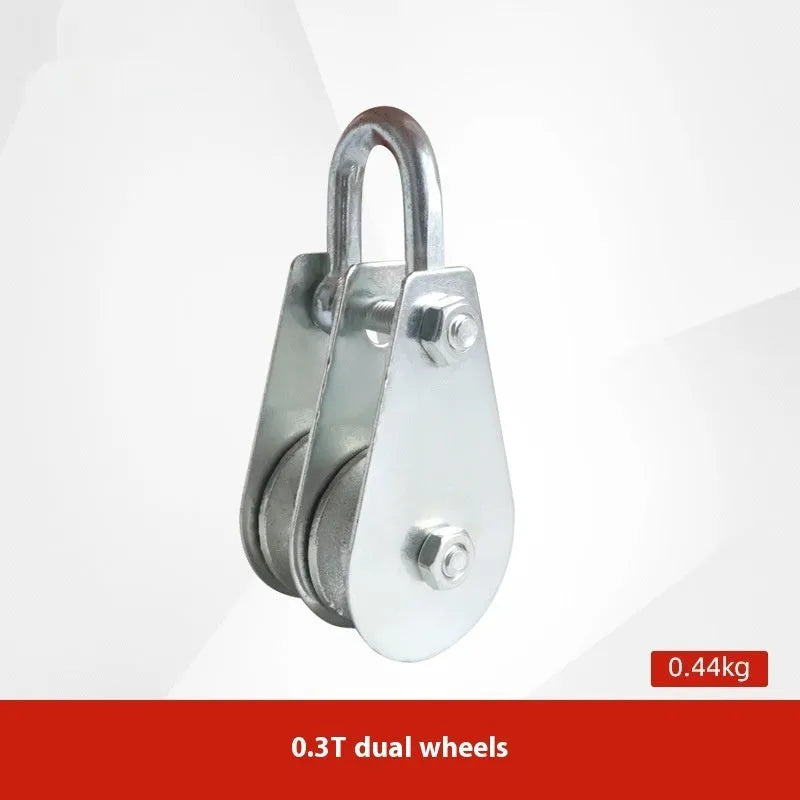 Red forged steel industrial lifting pulley with a safety latch on the hook