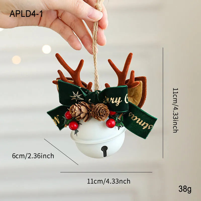 Wrought iron mixed pendant with antlers, bowknot, pine cone, and bell in golden finish