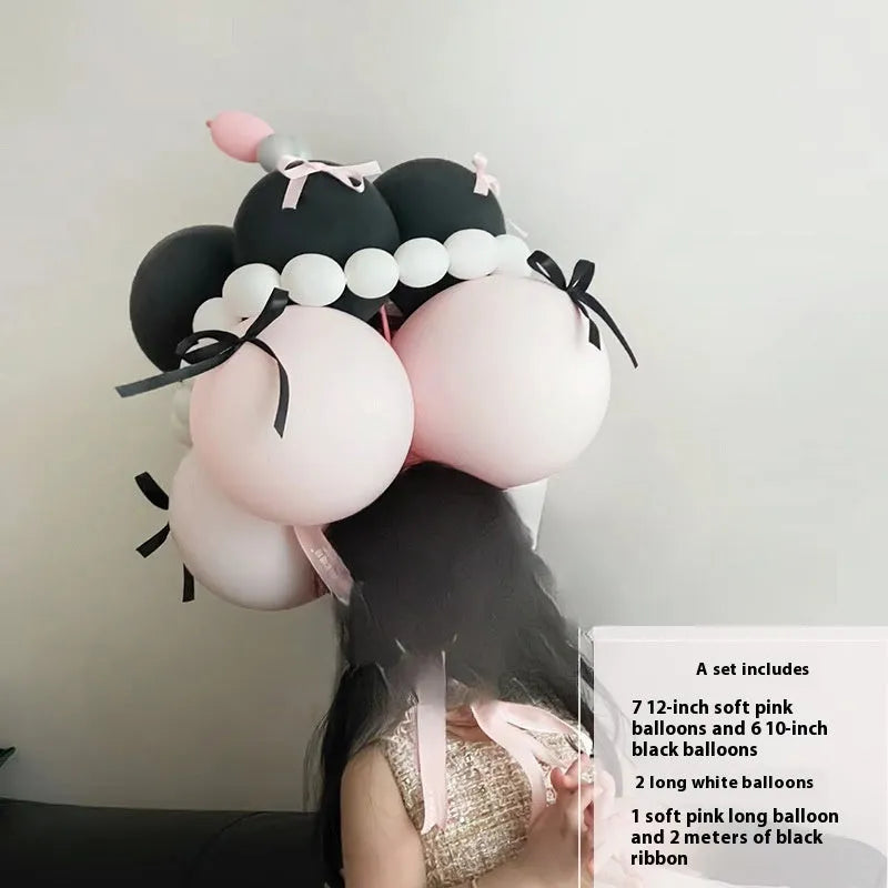 DIY balloon bouquet decoration kit with round balloons for cake toppers, showing one complete set.