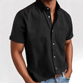 Men's loose fit short sleeve cardigan shirt in a cotton blend fabric on a hanger