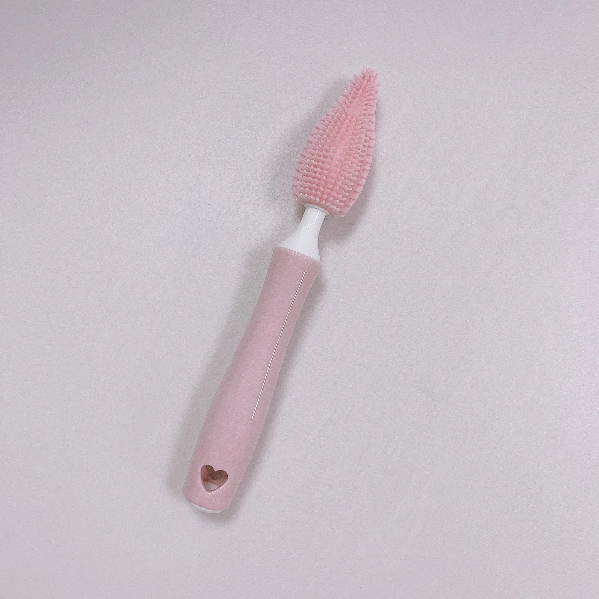 Silicone baby bottle brush and straw cleaner set in pink, blue, or yellow colours