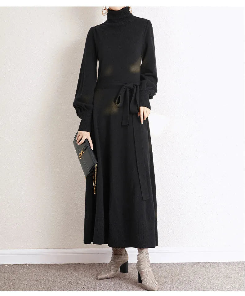 Turtleneck knitwear dress in polyester fabric with elastic waist and loose hem in solid colour