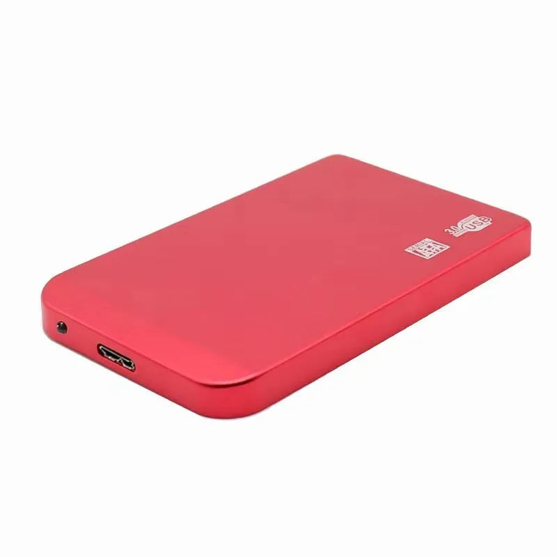 Silver metal external solid state drive with USB cable and cover next to packaging.
