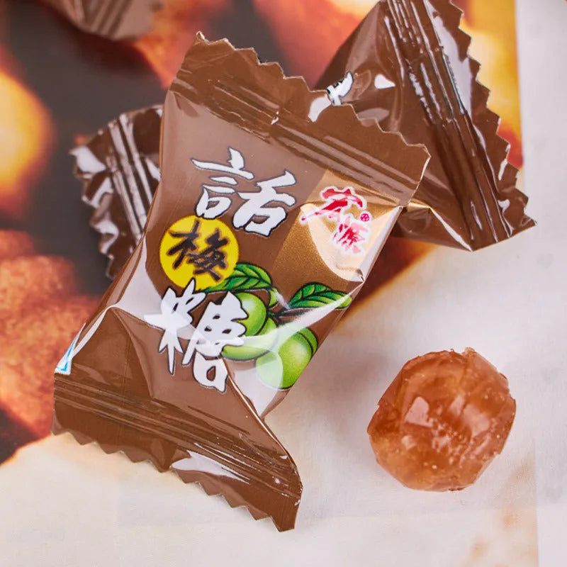Assorted bags of plum, guava, and tangerine peel flavoured hard sweets for parties.