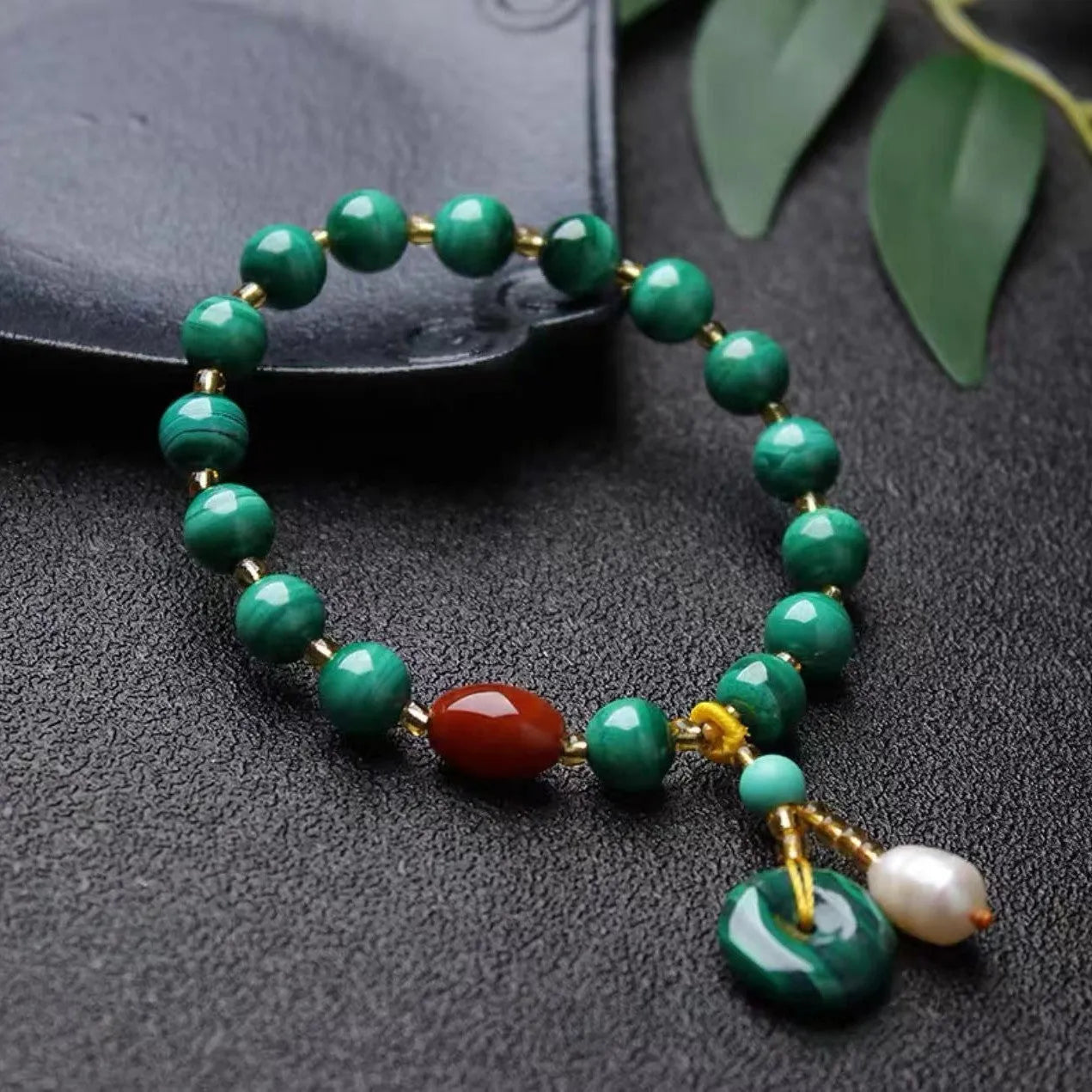 Natural green malachite and red agate barrel bead bracelet with approximately 7-8mm beads