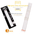 Three white charcoal sketching pencils with wooden barrels for highlighting artwork