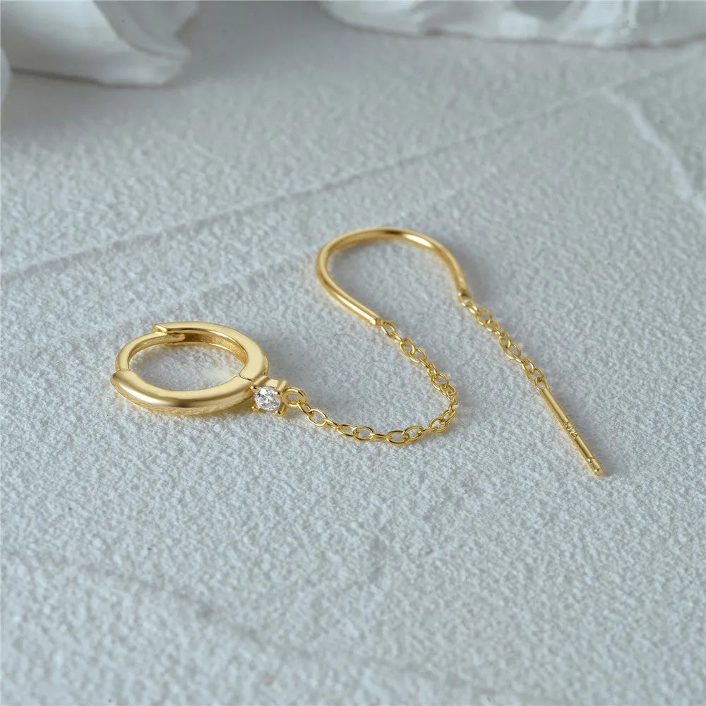 S925 sterling silver geometric ear clip studs with a diamond flower and tassel chain design in a gold electroplated finish.