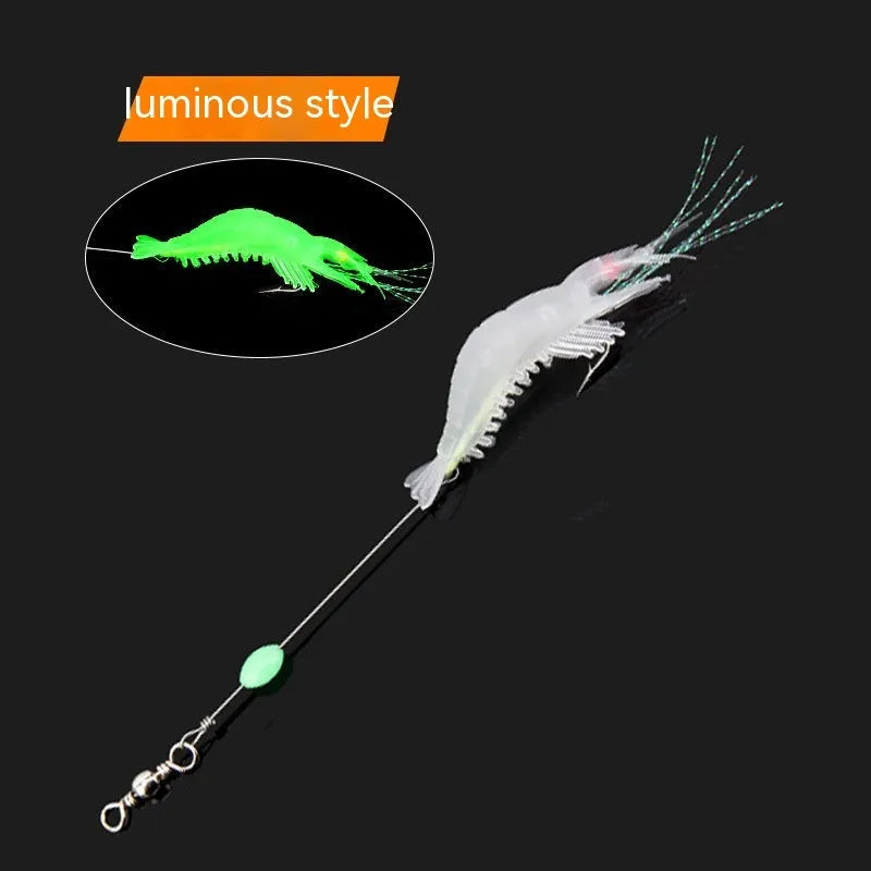 Six soft plastic fishing lures with integrated hooks in different colour variations including luminous patterns