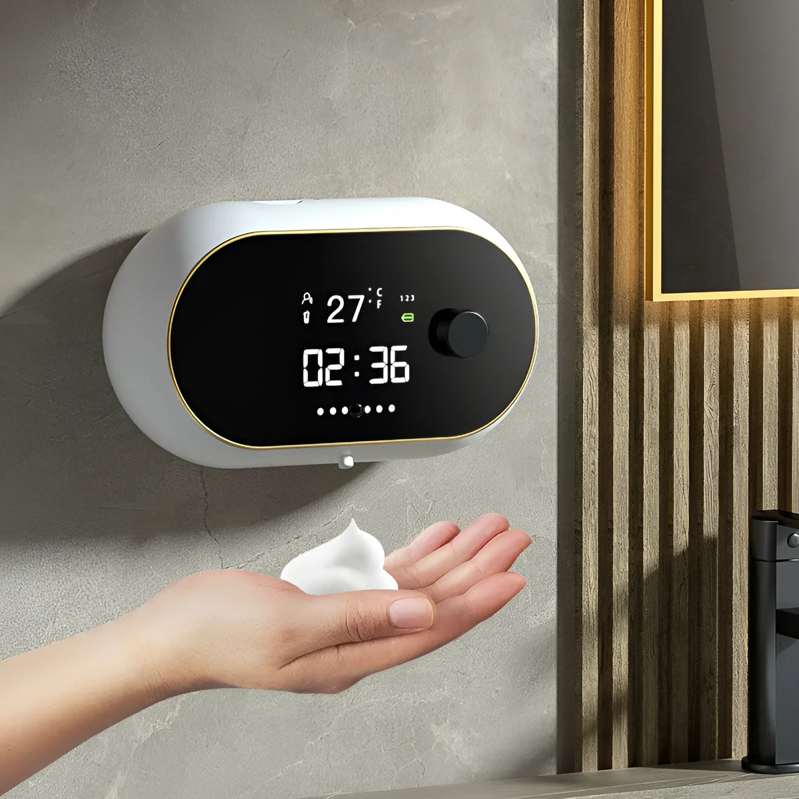 White automatic soap dispenser mounted on wall with infrared sensor and USB cable