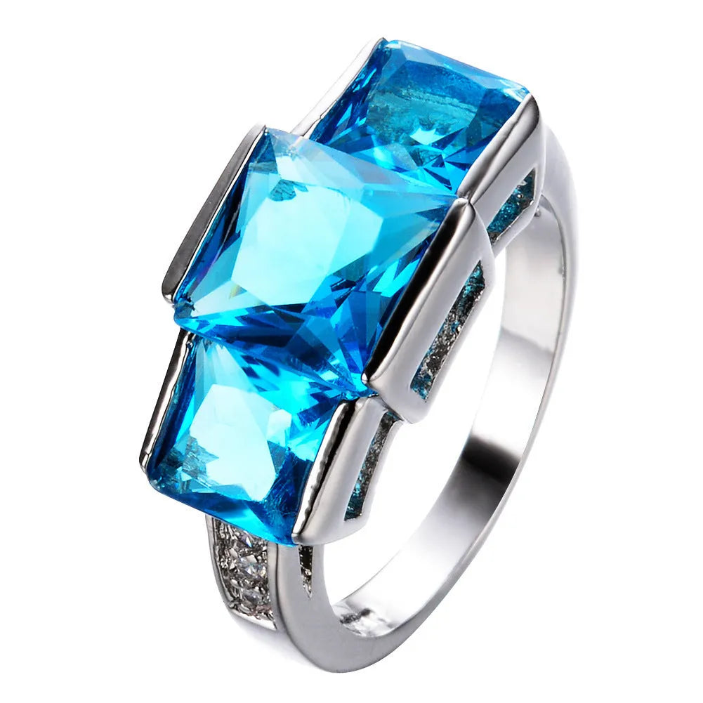 Copper women's ring with electroplated colour finish in geometric design showing multiple colour options