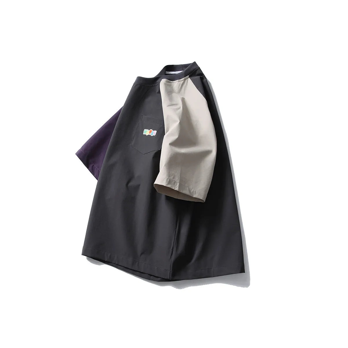 Dark grey loose fit t-shirt with contrast colour raglan short sleeves.