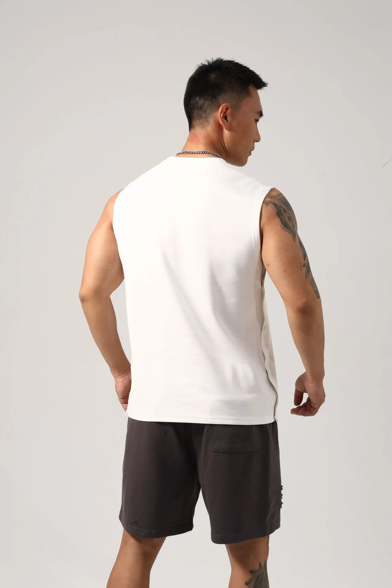 Korean style loose cotton fitness vest with hidden hook side openings in solid colour