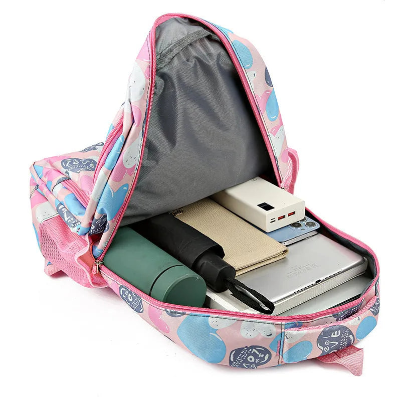 Children's large capacity Oxford cloth schoolbag with air pillow belt in blue, pink, gray, or rose red for burden alleviation