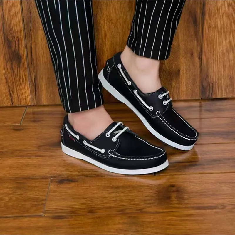 Men's black casual Oxford-style shoes with artificial PU leather upper and flat heel on a white background.