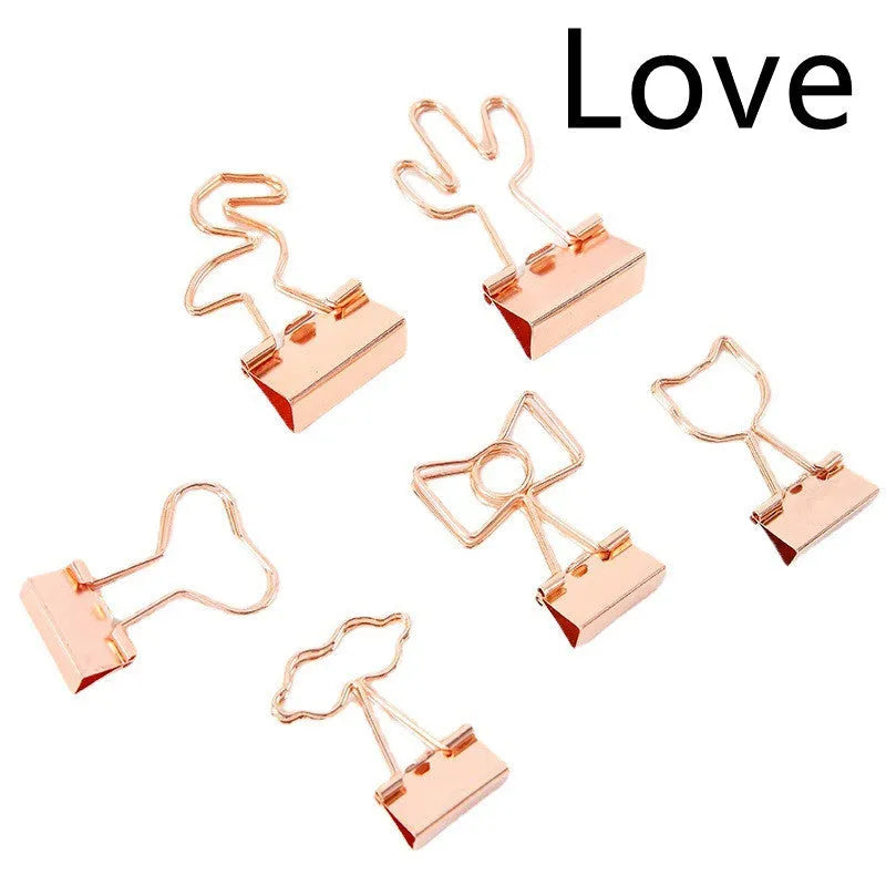 Gold metal decorative paper clip with long tail design in various shapes including flamingo, love and cat