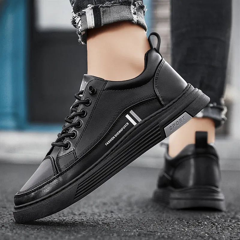 Men's white low-top skate shoes with microfibre upper, round toe, flat rubber sole and elastic band