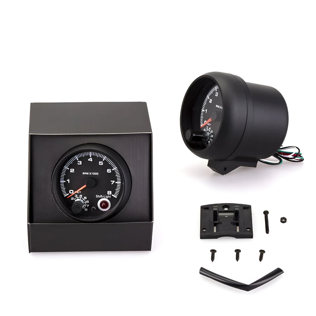 Black automotive tachometer with blue light pointer for engine speed measurement