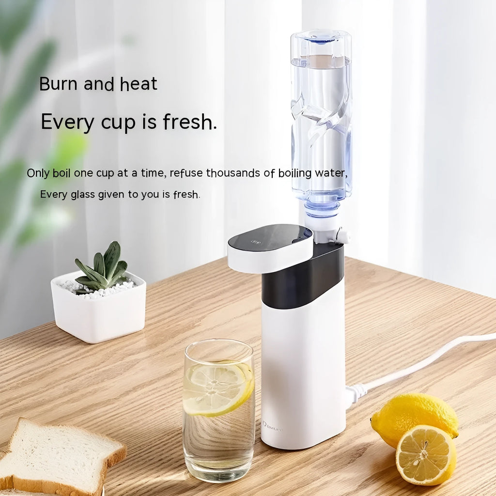 Black and green portable desktop instant water dispenser with digital display and small tank.