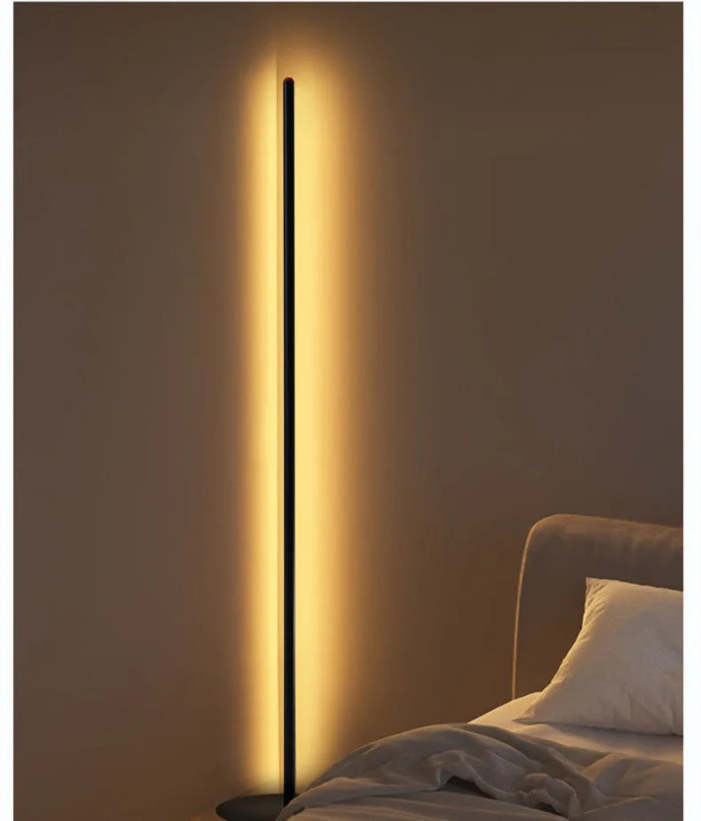Simple vertical aluminium alloy floor lamp in modern design showing three size options.