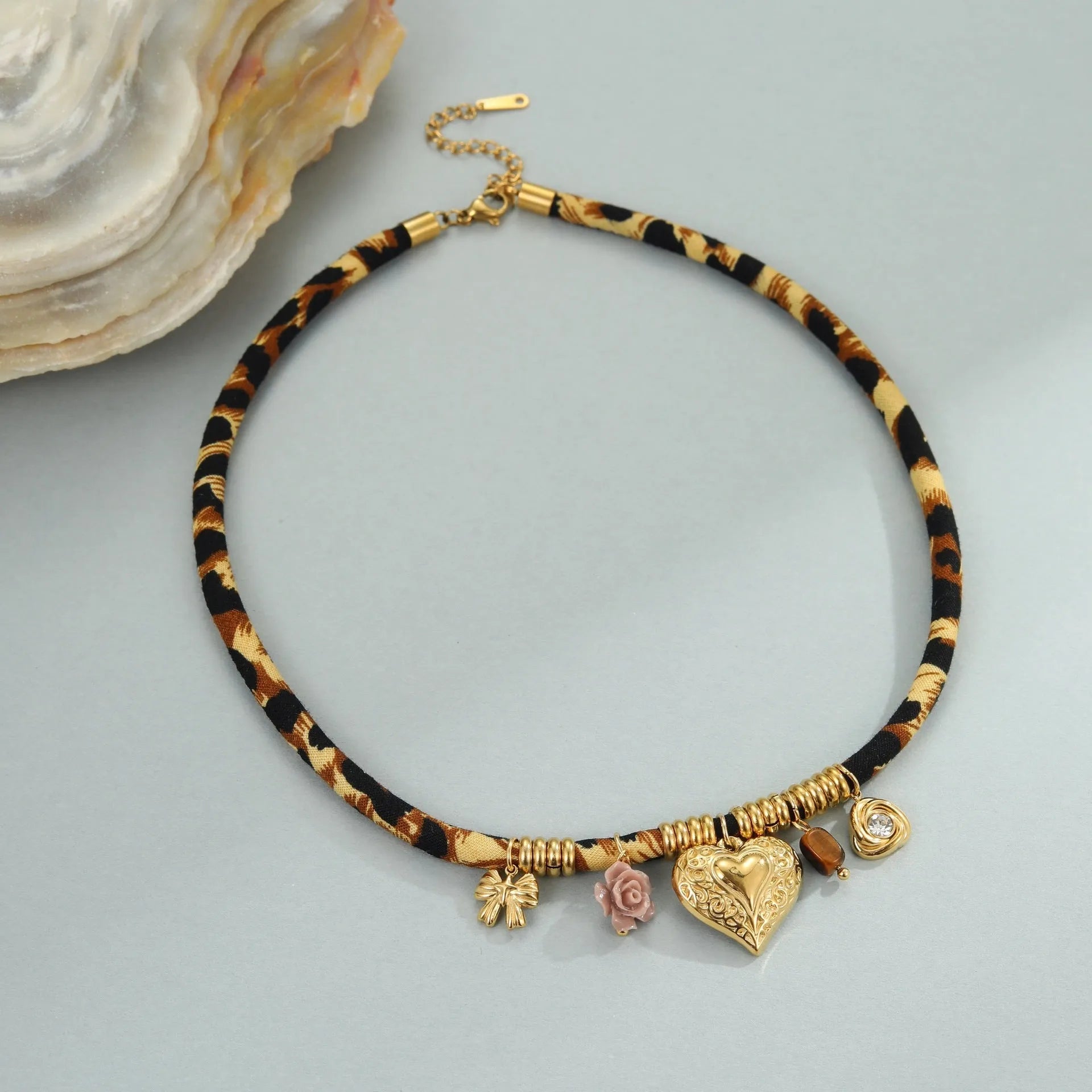 Leopard series stainless steel necklace with geometric pendant on regular chain, 18K electroplated finish