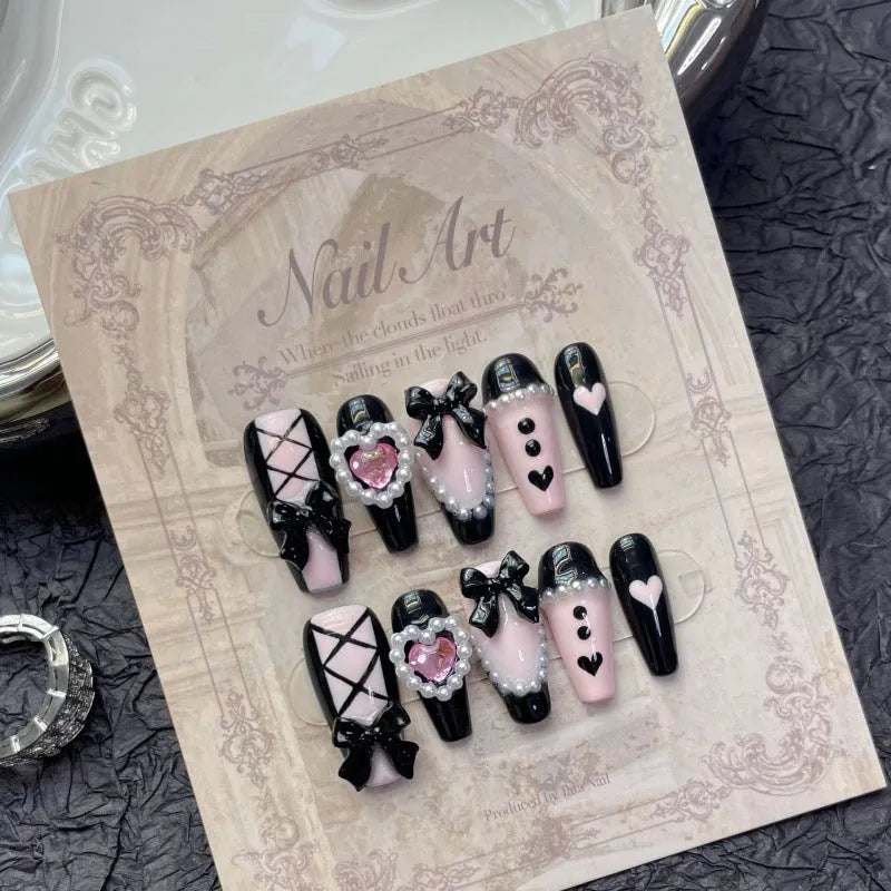 Black and pink peach heart hand-painted handmade manicure nails with cat's eye style